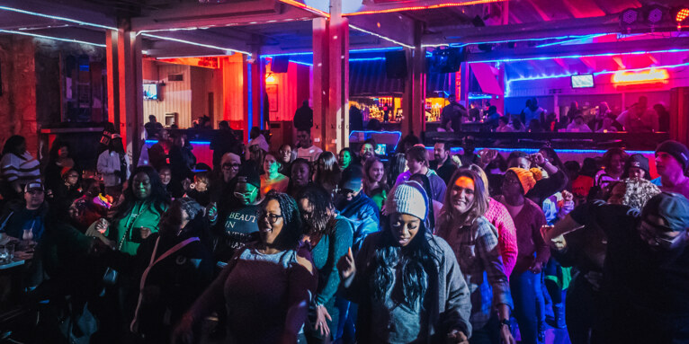 Guests dancing at the Live at the Lodge Party at the ski lodge at Massanutten Resort