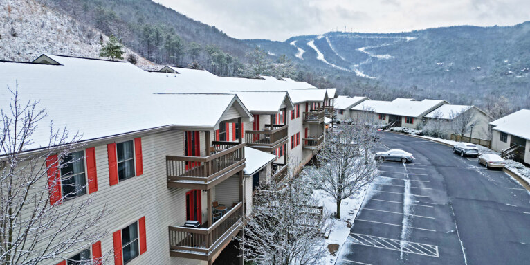 A scenic photo of Summit condos & the ski slopes at Massanutten Resort