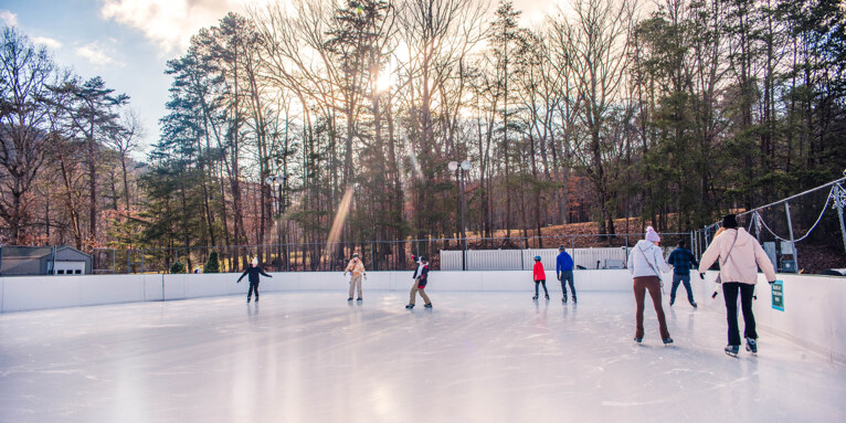 Guests ice skating at The Rink at Massanutten Resort