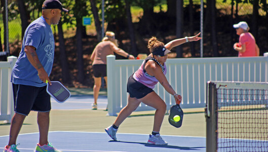 Guests playing pickleball at Massanutten Resort