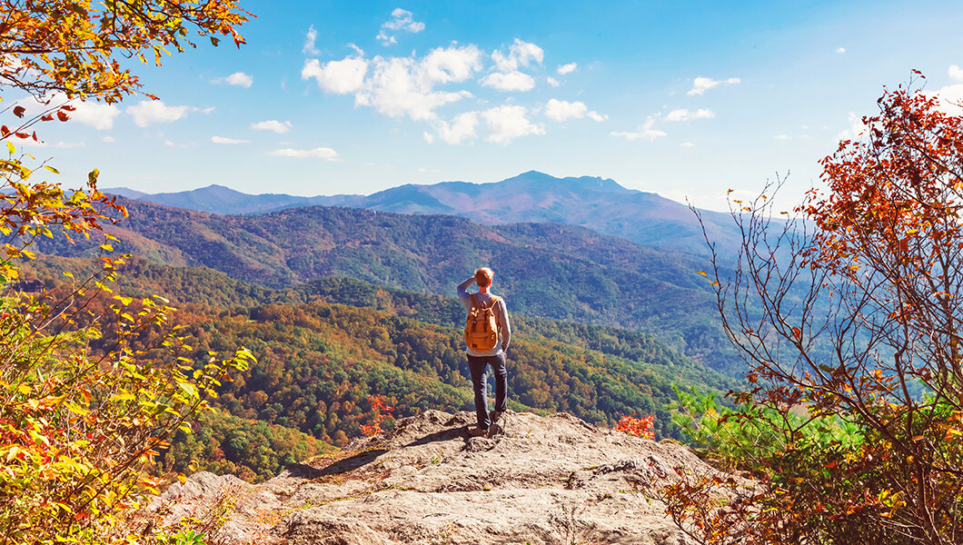 A guest hiking in the Shenandoah National Park