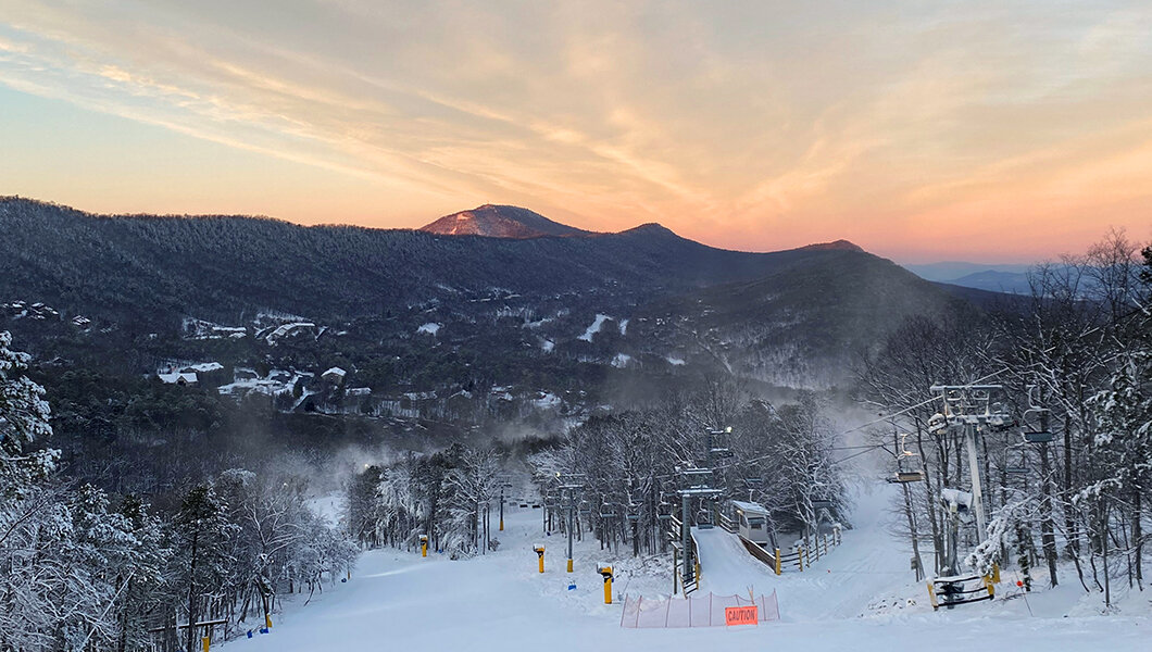 The ski slopes at sunset at Massanutten Resort