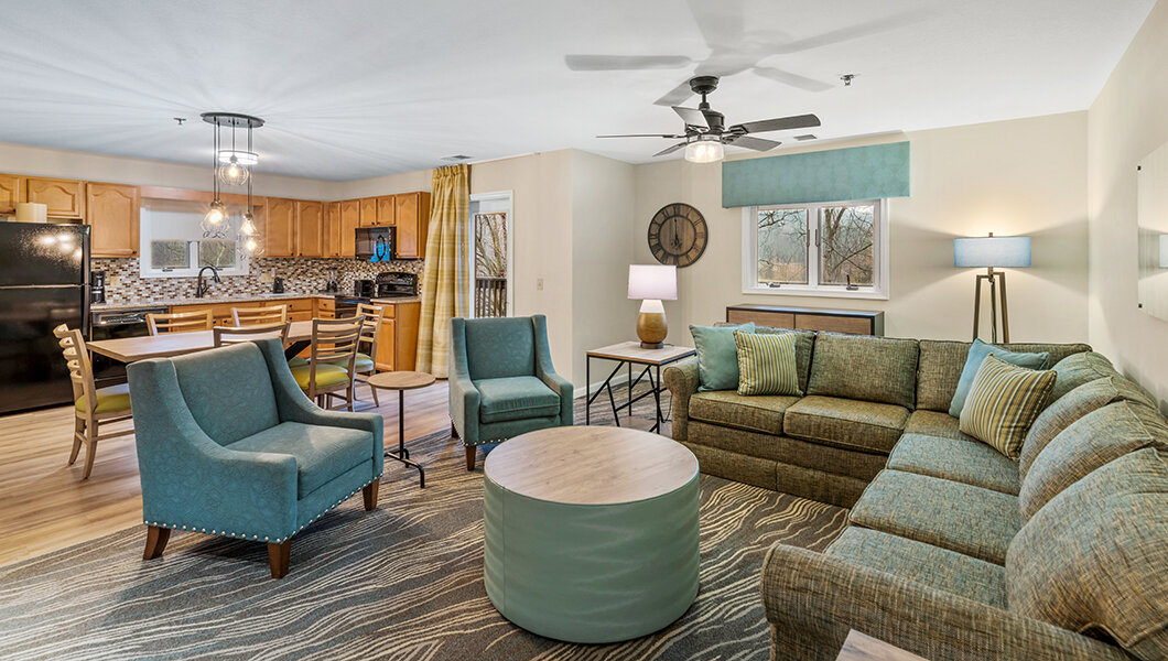 A living room in a Woodstone Meadows condo at Massanutten Resort